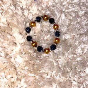 Black and gold marble glass beaded bracelet